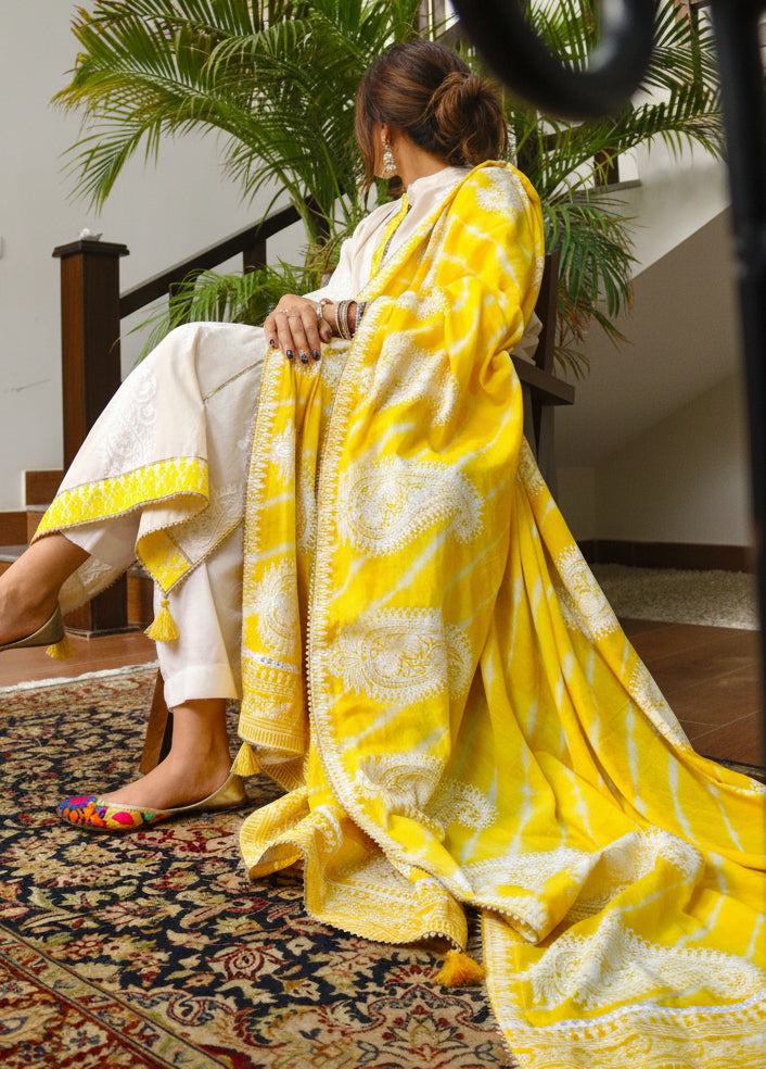 Marigold artisan block-print detailing on lawn fabric